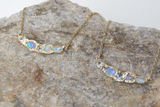 2 14k yellow gold Journey Treasure Opal Mermaid Necklaces.