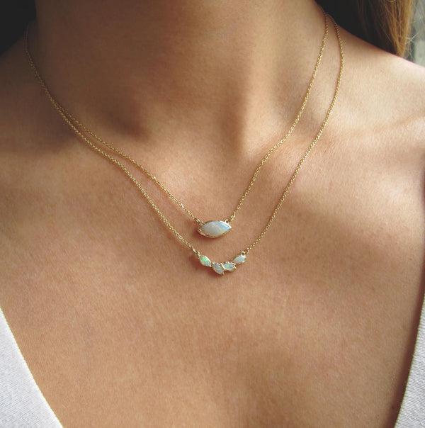 14k Yellow Gold Petal Opal Necklace on Woman's Neck.