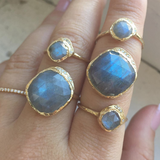 5 14K Yellow Gold Labradorite Cove Rings on woman's hand. 