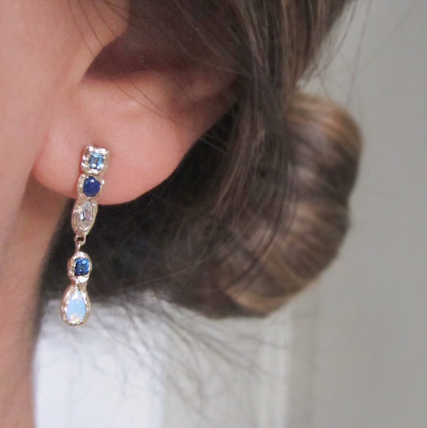 14K Waterfall Lapis Earrings on Woman's Ear.