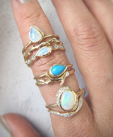 3 Sets of Opal Eternity Rings.