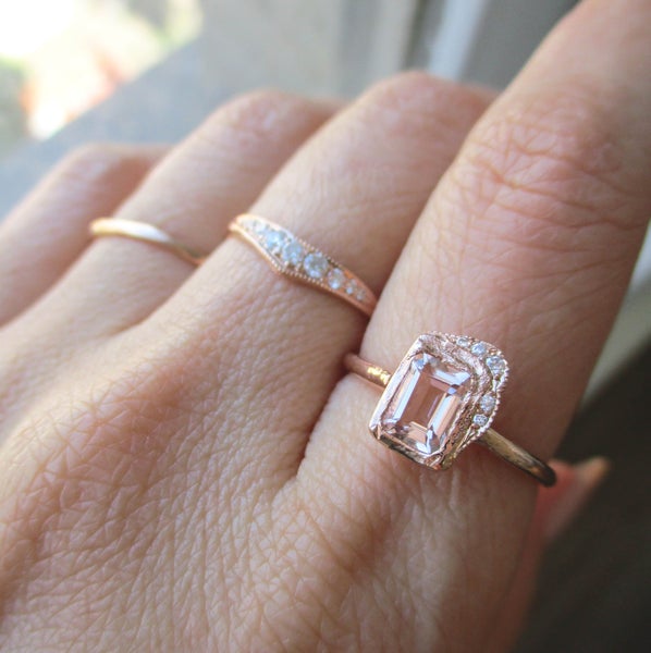 3 morganite handcrafted rings on model's hand 