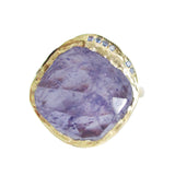 14K yellow gold tanzanite cove ring with blue sapphires