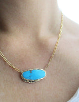 14K yellow gold turquoise necklace with black diamonds on the neck Kingman Turquoise