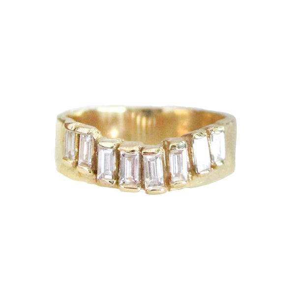 14K gold ring with baguette-cut diamonds on a white background