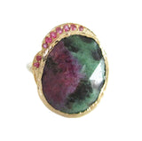 14K yellow gold ring with large ruby zoisite and rubies on white background