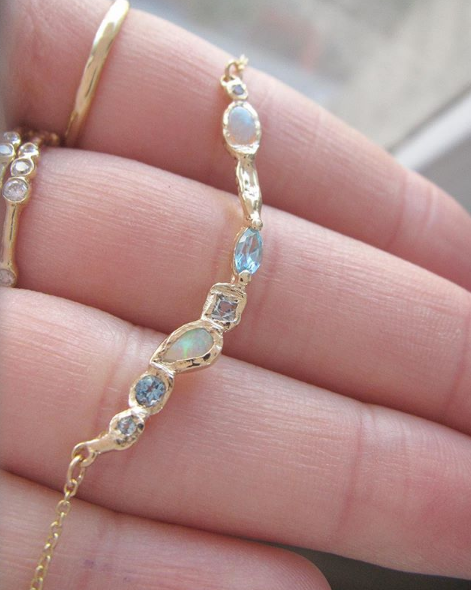 Ama Mermaid Necklace made with Opal, blue topaz and aquamarine Close-up.