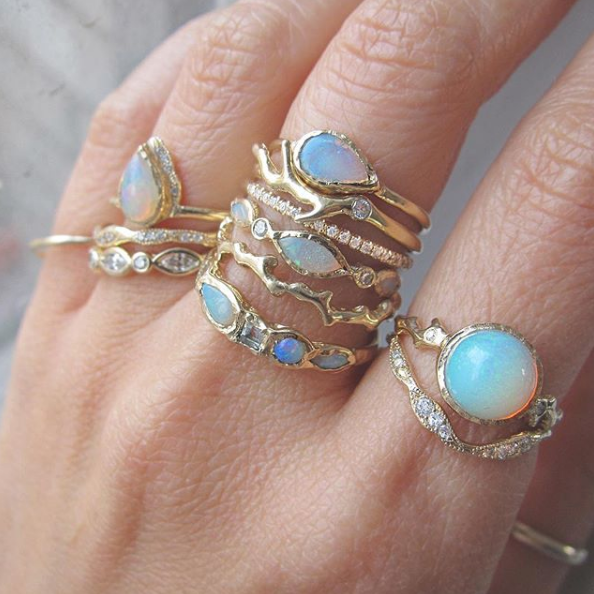 14K Opal Rings on Woman's Hand.