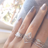 14K White Gold Beak Rings with diamonds on woman's hand.