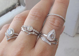 3 sets of 14k white gold rings with diamonds.