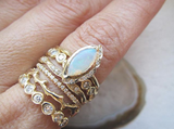 Yellow Gold Fire Coral Ring on woman's index finger.