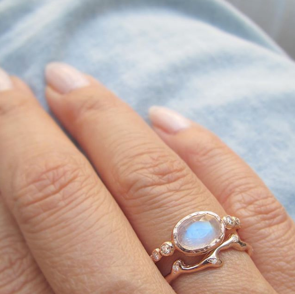 One Freshwater Moonstone Ring with White Round Brilliant Diamonds.
