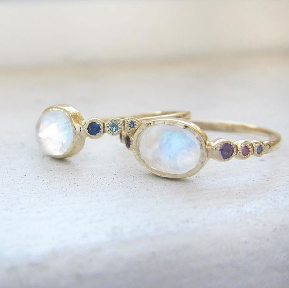 Two Freshwater Moonstone Rings with White Round Brilliant Diamonds.