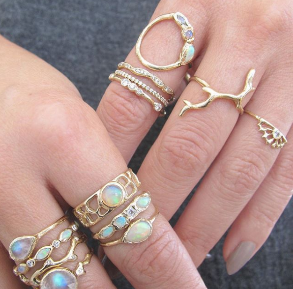 14K Yellow gold rings on woman's hands. 