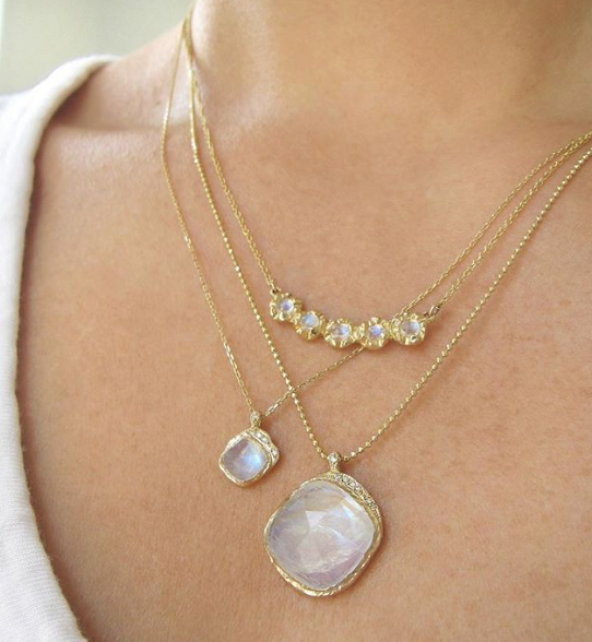 14K Yellow Gold Lei Necklace and Two Other Moonstone necklaces on Woman's Neck