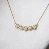 Hanging 14K Yellow Gold Lei Necklace.