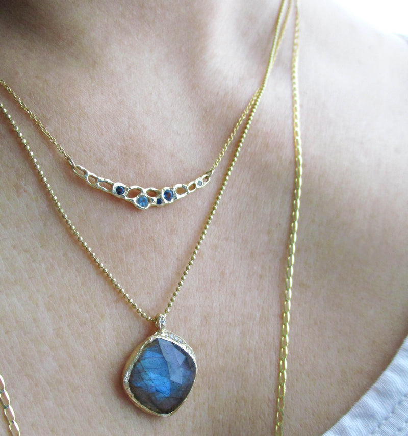 Misa Jewelry Tide Pool Blue Necklace and Labradorite Cove Necklace sapphire aquamarine blue topaz 14K gold necklace on the neck