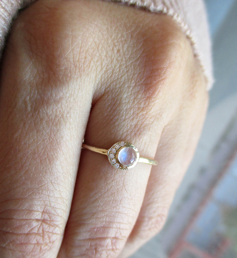 14k Baby Moon Ring with Rainbow Moonstone on Woman's Hand.
