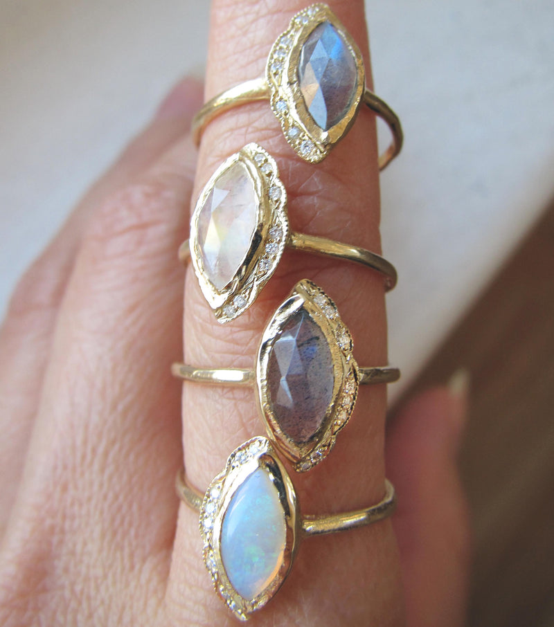 Native Moonstone Ring Staggered on Woman's Hand.