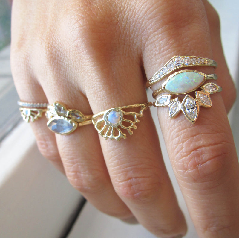 14k Opal Sol Ring on Woman's Hand. 