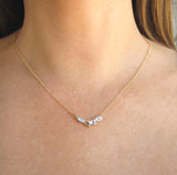 14k Yellow Gold Petal Moonstone Necklace on Woman's Neck.