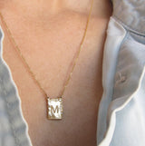 14k Reflection Monogram Necklace on Woman's Neck.