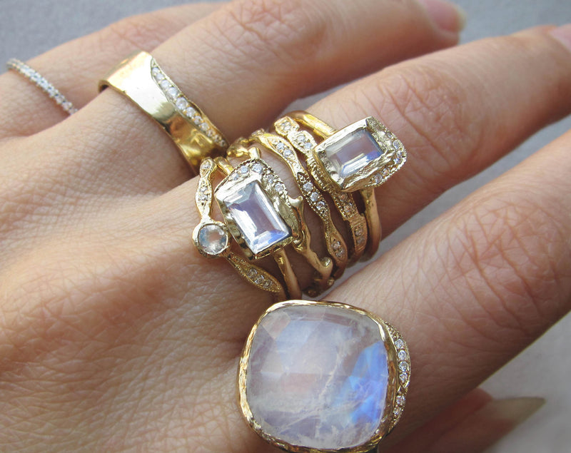 Reflection NS Moonstone Ring on Woman's Hand. 