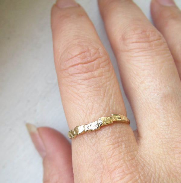 14k Yellow Gold Scenic Ring on Woman's Hand.