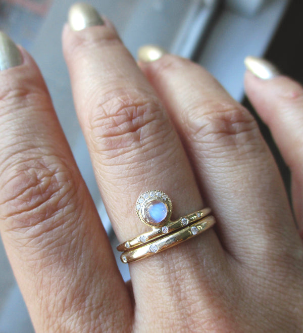 14k Shelter Moonstone Ring with 4mm rainbow moonstone and white round brilliant diamonds.