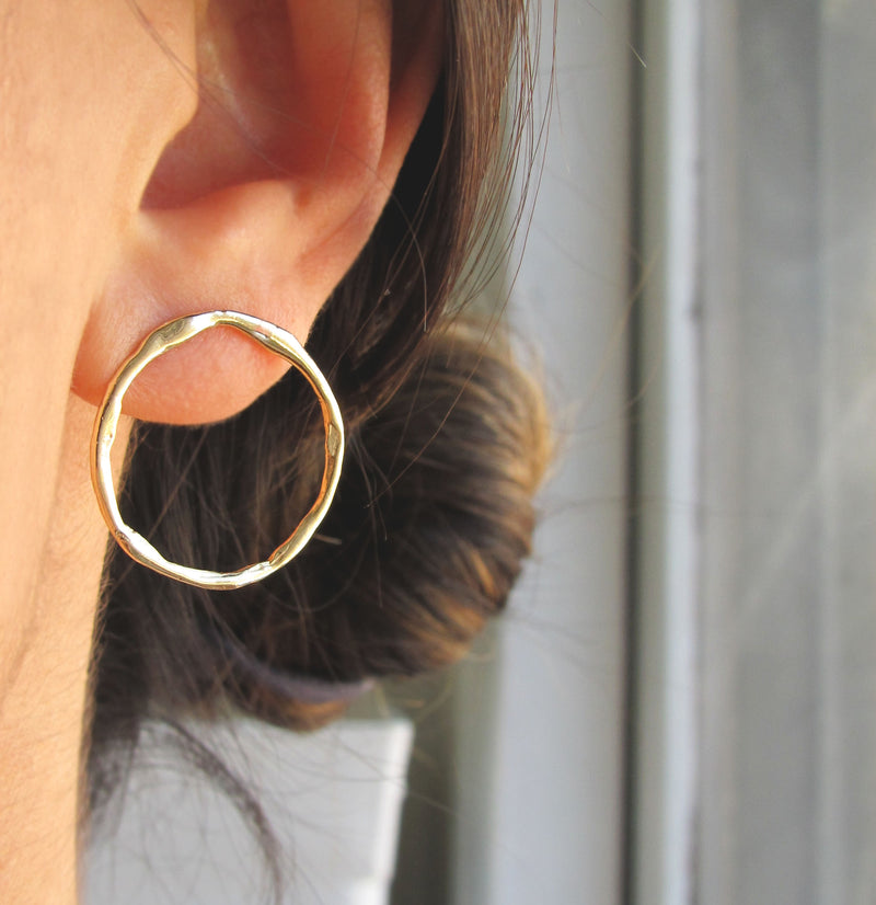 22mm Full Circle Small Hoops on Woman's Ear.