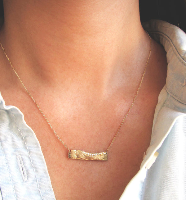 Trail Diamond Necklace with White Round Brilliant Diamonds on Woman's Neck.