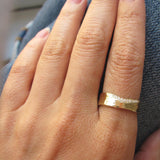 14k Yellow Gold Trail White Diamond 6mm Ring on Hand.
