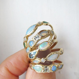 Five Marina mermaid ring with blue topaz, opal and aquamarine.
