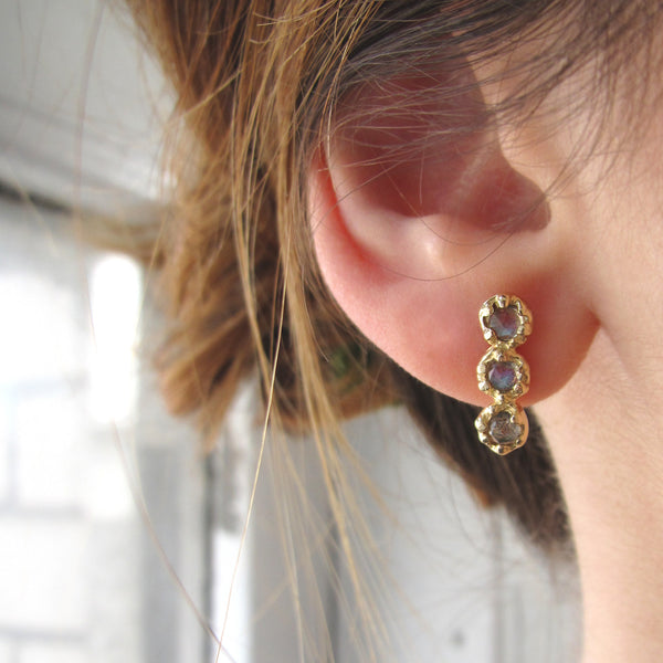Mini Haku Lei Earrings on Woman's Ear wore Vertically.