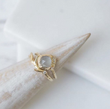 14K Mini Cove Aquamarine Ring with twinkling strip of pavé-set diamonds on mandrel.