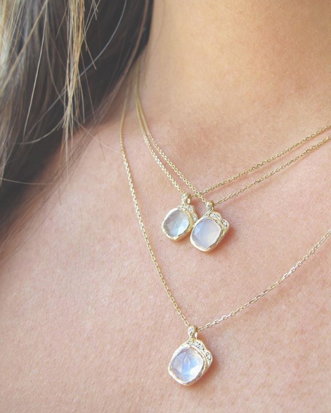 Three mini cove moonstone necklace with white round brilliant diamonds.