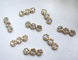 4 Sets of Mini Haku Lei Earrings.