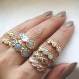 14K Mini Haku Lei 3 Moonstone Ring with Larget Collection on Woman's Hand.