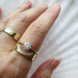 White round brilliand diamonds with canyon diamond ring.