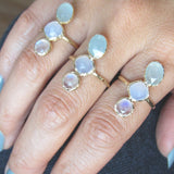Three 14K Stepping Stone Ring on Woman's Hand.