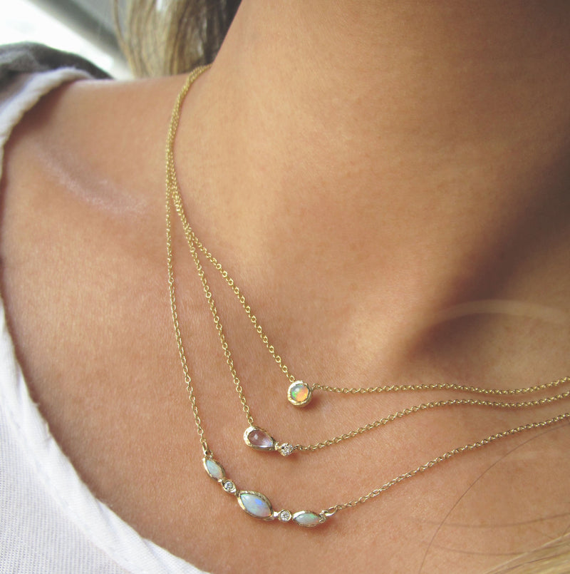 Aurora Necklace on woman's neck.