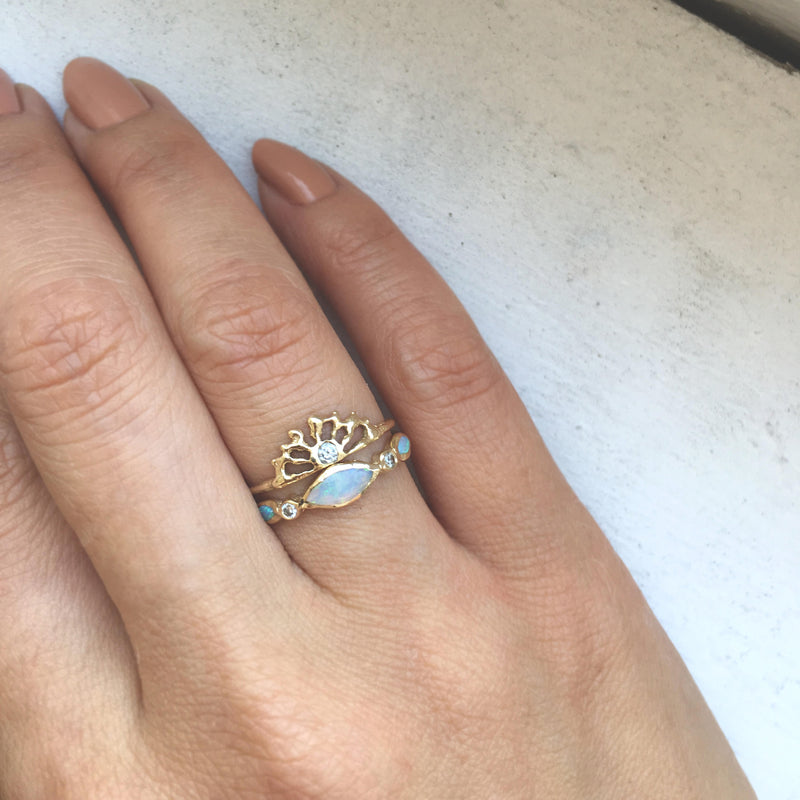 14K Aurora Opal Ring on Woman's Hand.