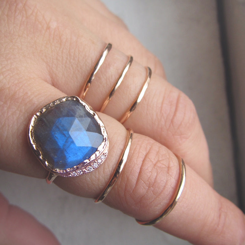 14K Yellow Gold Labradorite Cove Ring on woman's index finger. 