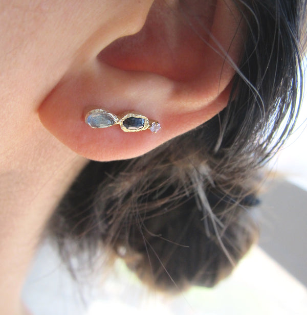 Ear Crawler made with Labradorite, navy sapphire and tanzanite on Woman's Ear.