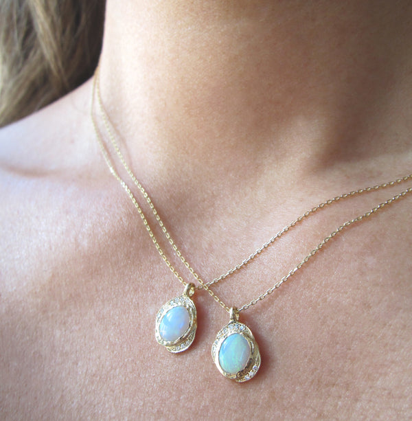 14K Yellow Gold Oasis Opal Necklace on Woman's Neck.
