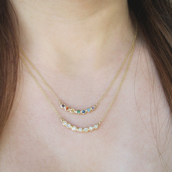 Tauri Rainbow Necklace on woman's neck.