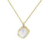 Mini cove moonstone necklace with white round brilliant diamonds.