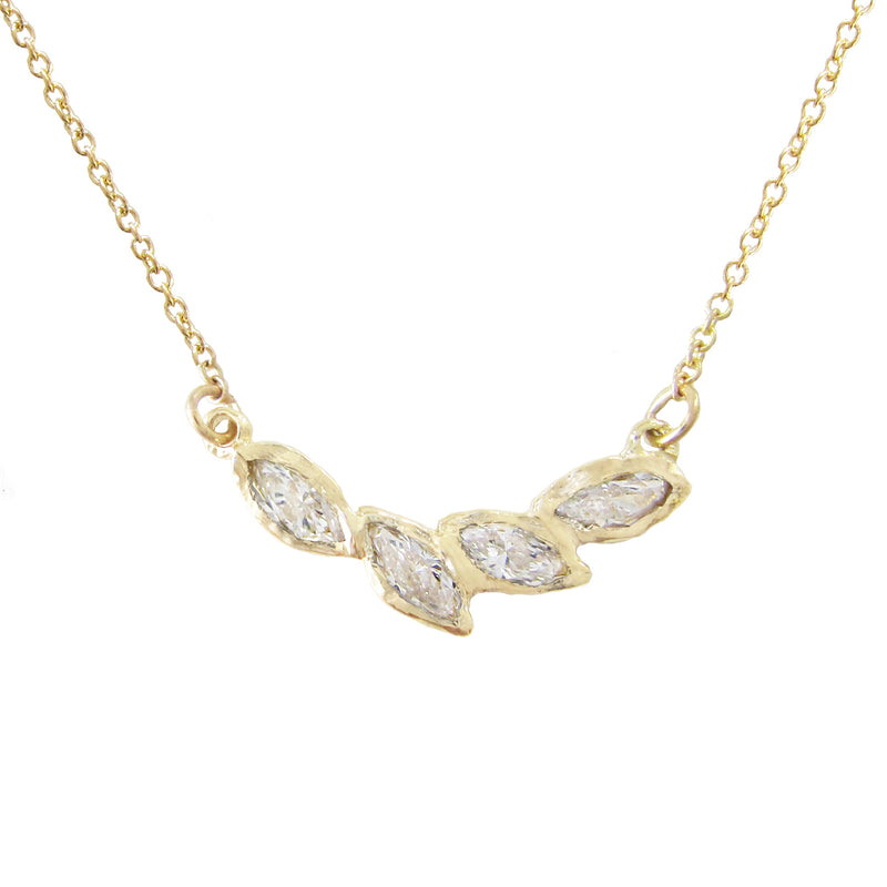 14k Petal diamond necklace with marquis diamonds.