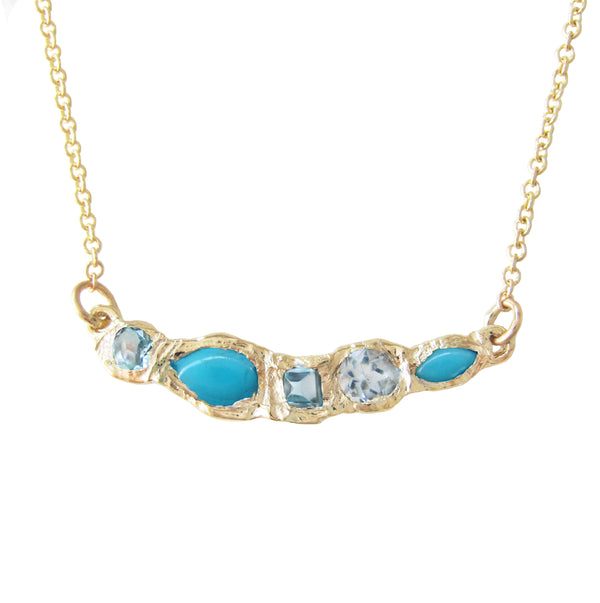 Turquoise and blue topaz yellow gold necklace. 