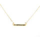 Mini Yellow gold necklace with black diamonds.